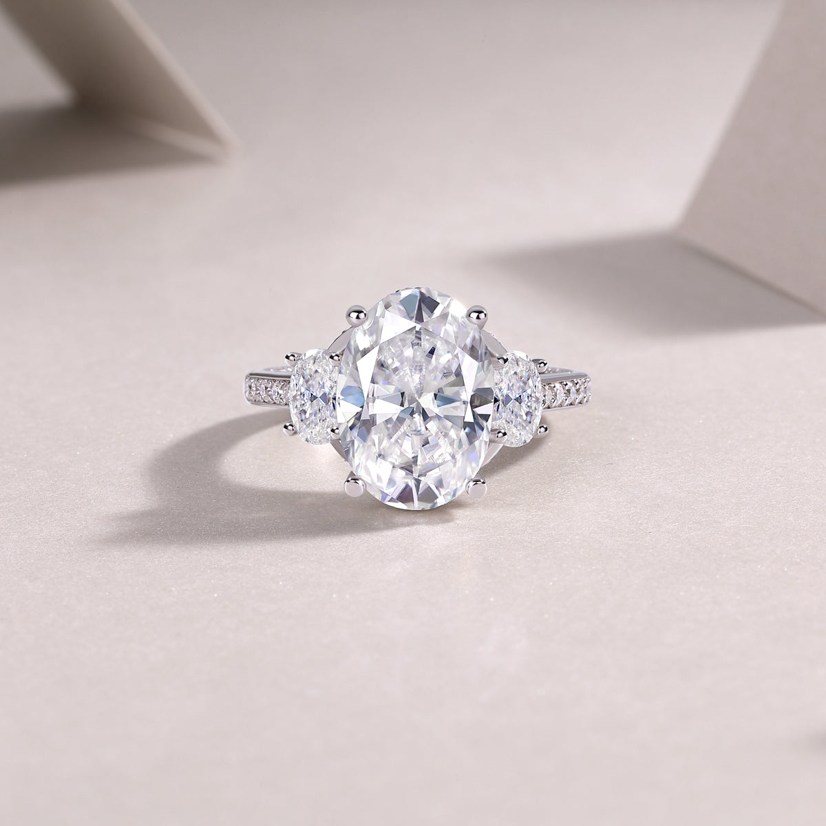 Crown of Radiance Oval Moissanite Three-Stone Ring | 925 Sterling Silver
